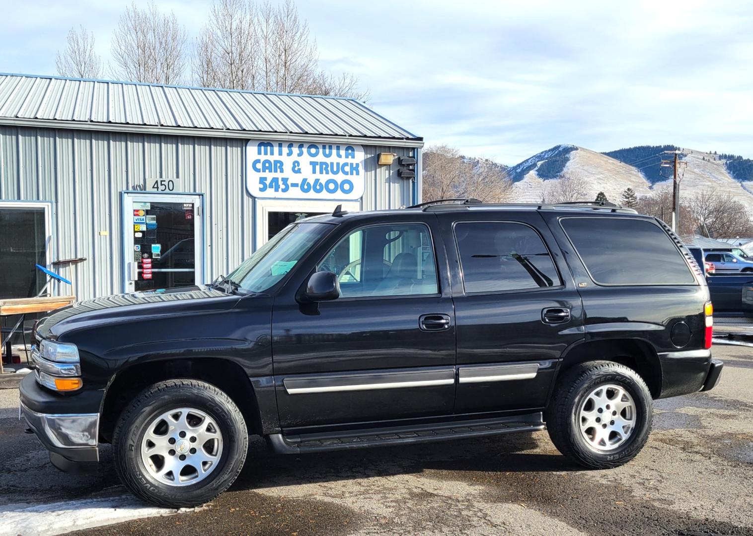 2006 Black /Tan Chevrolet Tahoe LT (1GNEK13Z76R) with an 5.3L V8 engine, Automatic transmission, located at 450 N Russell, Missoula, MT, 59801, (406) 543-6600, 46.874496, -114.017433 - Great Running Tahoe 4WD. 3rd Row Seat. Power Sunroof. Rear Entertainment. Power Heated Front Seats. Leather Seats. Front and Rear Climate Control. Running Boards. Cruise Control. Tilt. - Photo#0